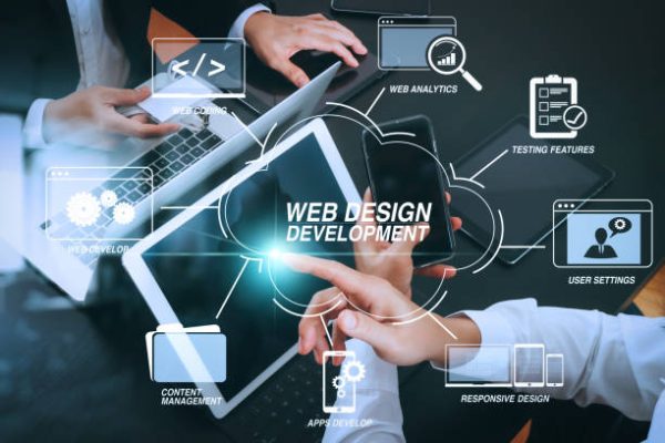 Developing programming and coding technologies with Website design in virtual diagram.co working team meeting concept,businessman using smart phone and digital tablet and laptop computer and name tag in modern office